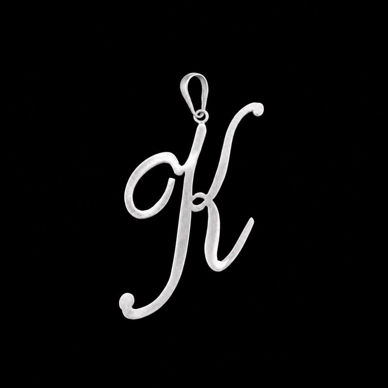 Dije de Letra K