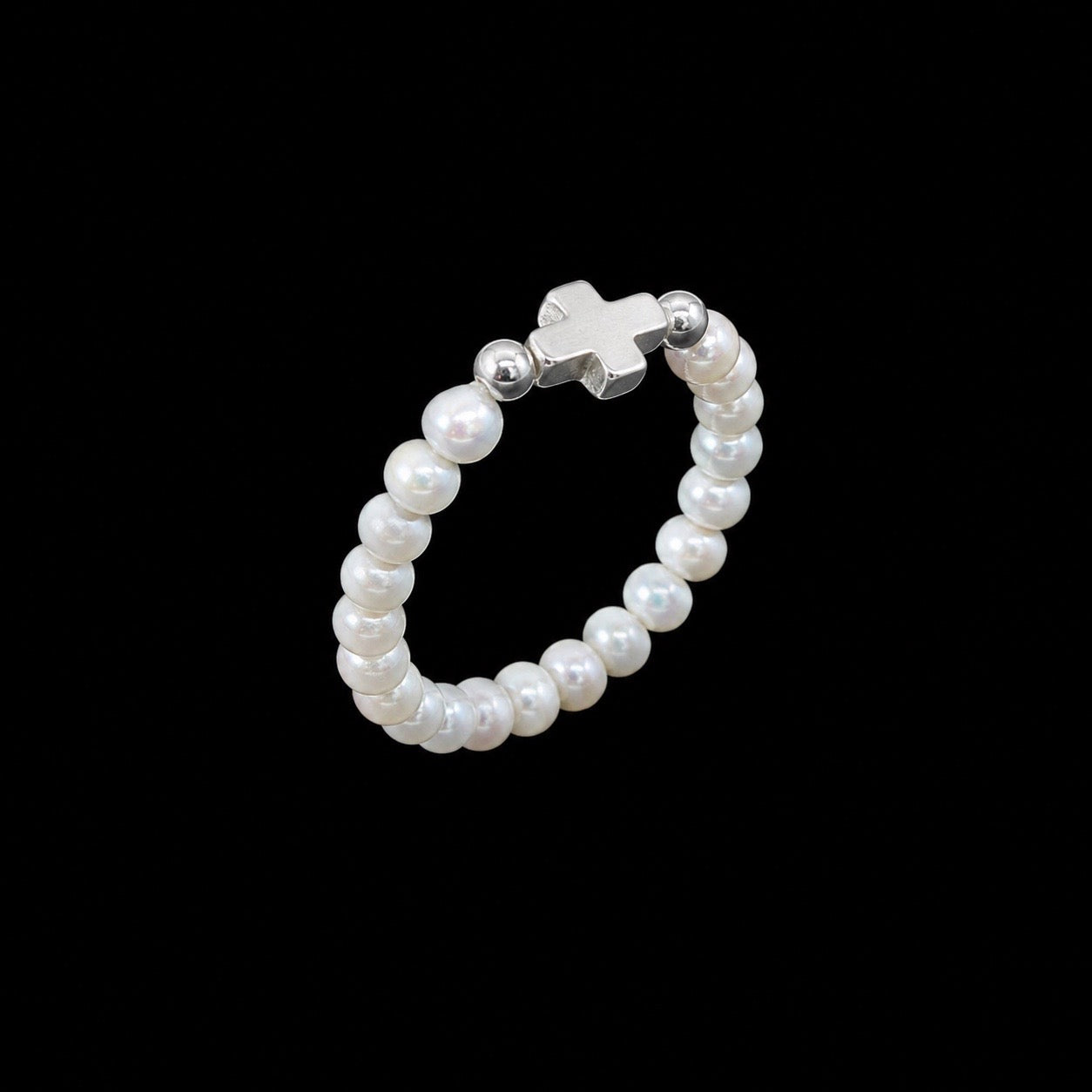 Anillo Elástico Cruz con Perlas de Río