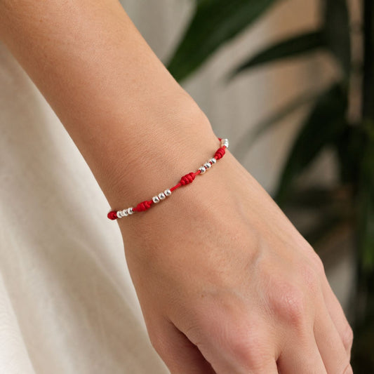 Pulsera 7 Nudos con Tres Perlas