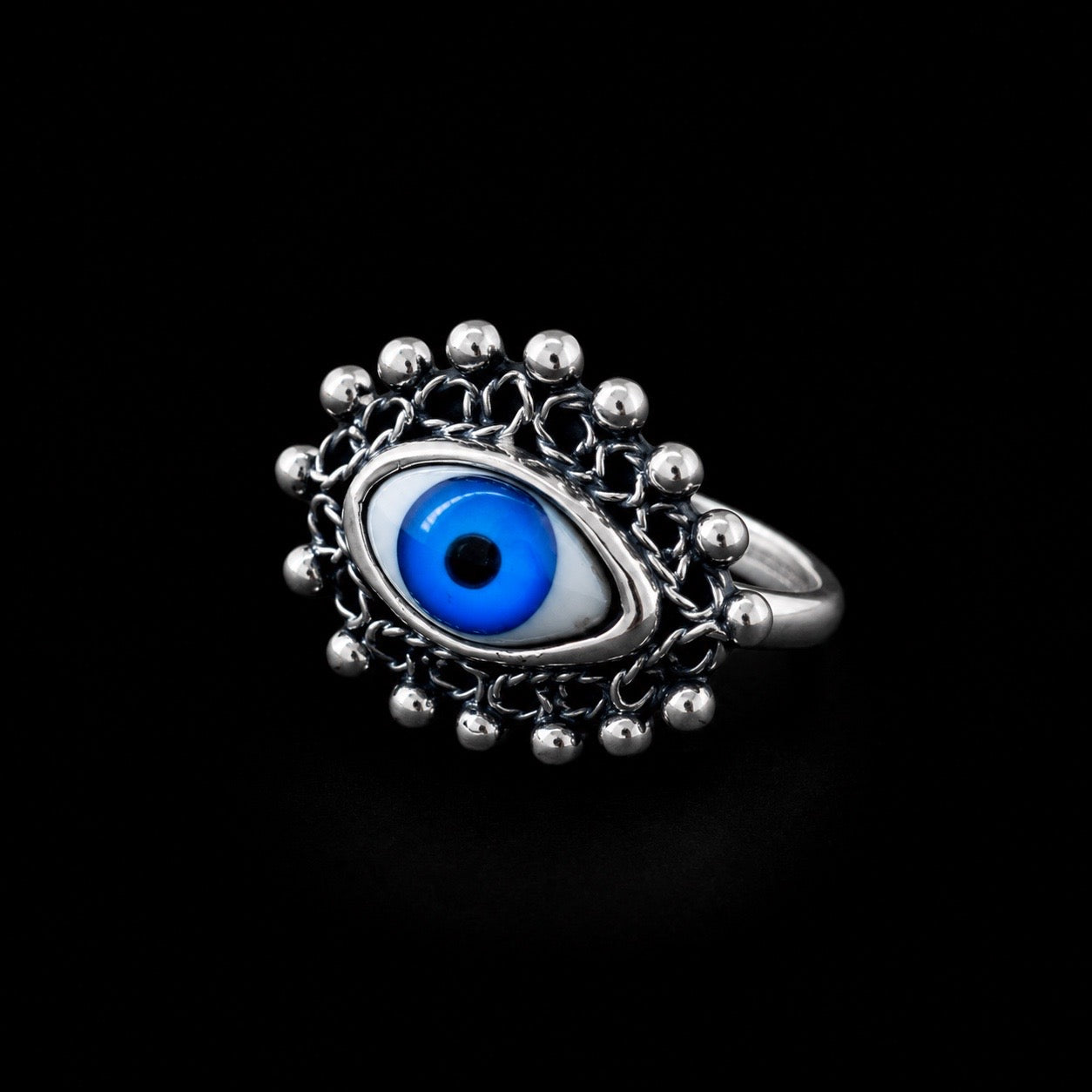 Anillo Ojo Turco con Marco de Perlas