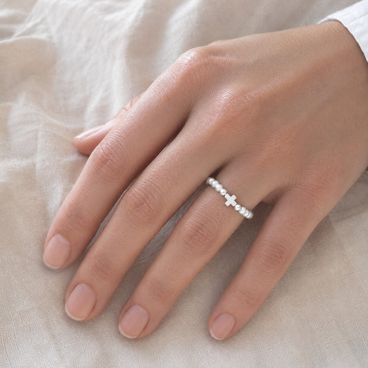 Anillo Elástico Cruz con Perlas de Río