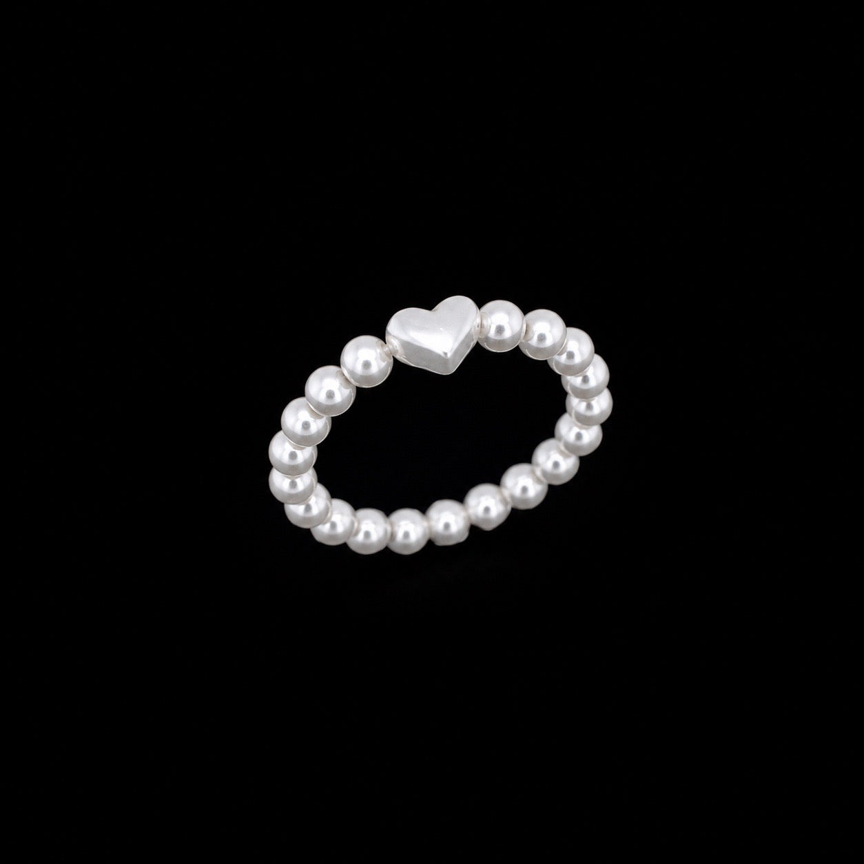Anillo Elástico Corazón de Perlas de Plata
